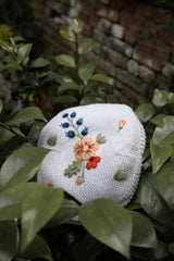 Up close of a Midsummer Bonnet displayed in a nature setting