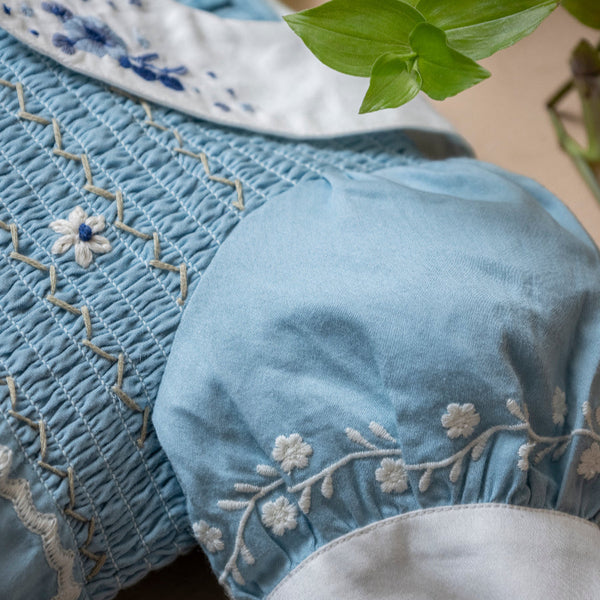 blue sewn romper for baby