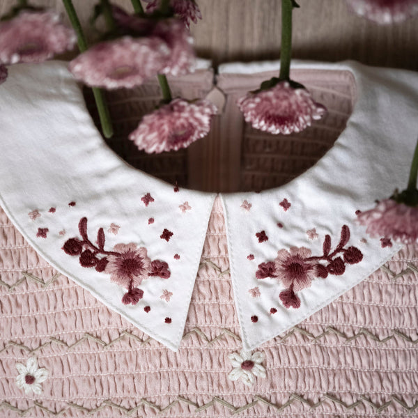 sewn pink baby romper