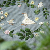 close up of embroidery on kids sweater