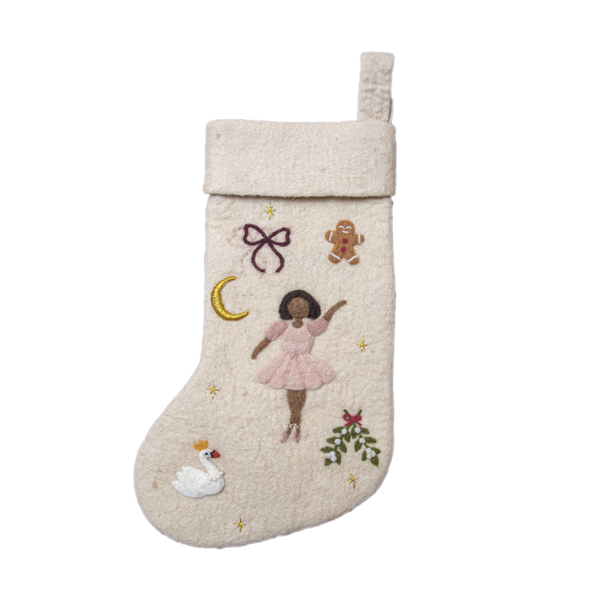 Fully handcrafted cream white holiday stocking featuring an embroidered ballerina and enchanting holiday motifs, made from 100% wool.