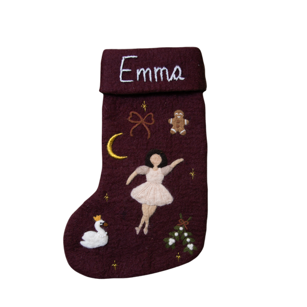 Fully handcrafted dark grape holiday stocking featuring a personalized embroidered ballerina and enchanting holiday motifs, made from 100% wool.