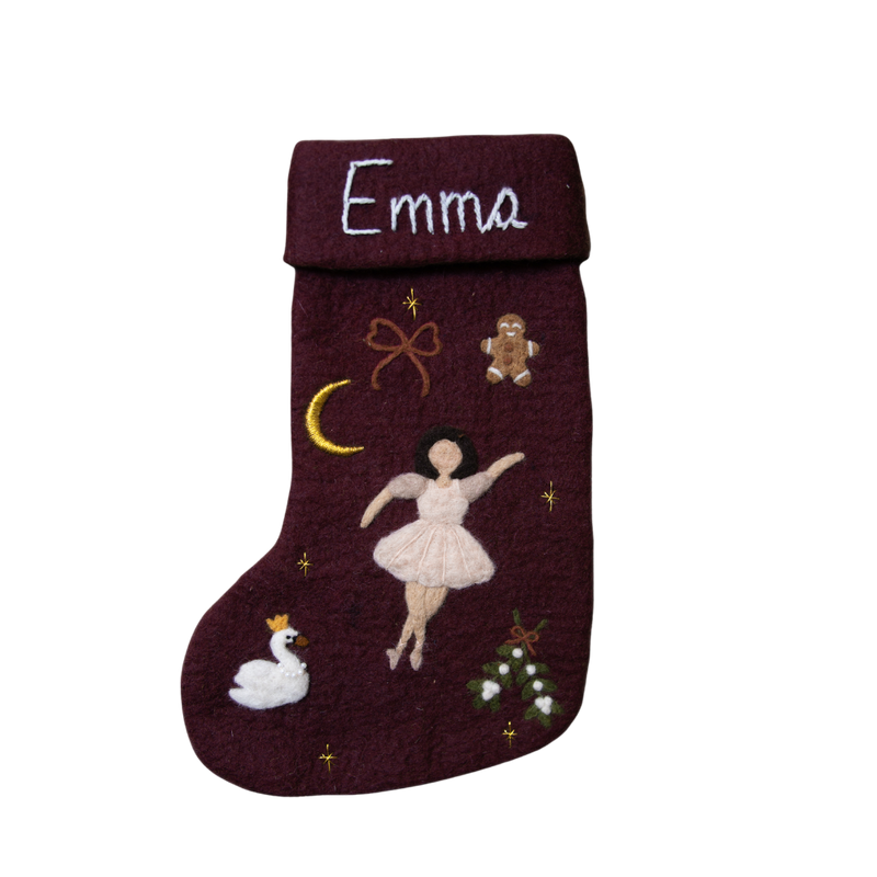 Fully handcrafted dark grape holiday stocking featuring a personalized embroidered ballerina and enchanting holiday motifs, made from 100% wool.