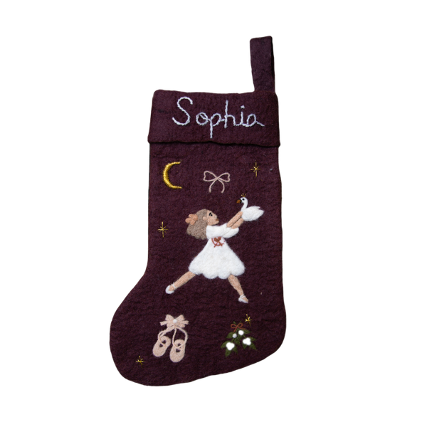 Handcrafted dark grape stocking with embroidered Odette and a personalized name in cursive, showing off its intricate details and festive charm.