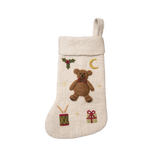 Fully handcrafted cream white holiday stocking featuring a meticulously embroidered teddy bear, made from 100% wool. A charming addition to festive decor.