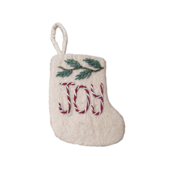 Mini Stocking featuring hand-embroidered 'JOY' and pine branch motif. The detailed embroidery adds a festive touch to holiday decorations.