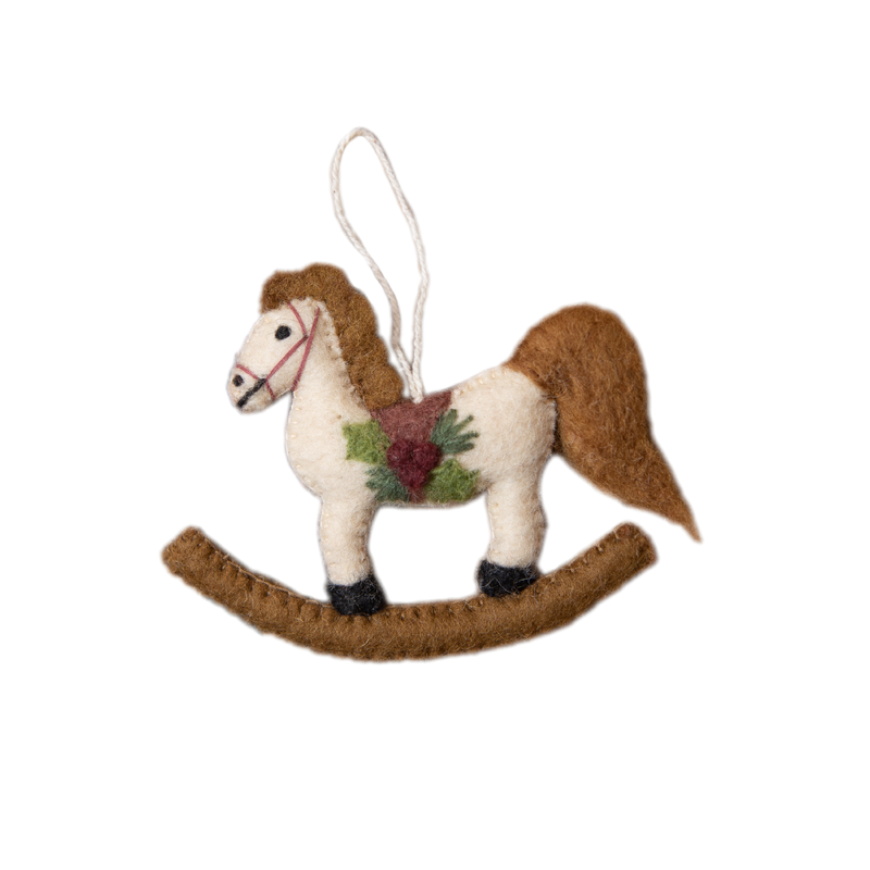 Hand-felted rocking horse ornament in soft wool, featuring meticulous craftsmanship and capturing the nostalgic charm and joy of childhood.