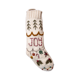 Christmas stocking with 'Joy' embroidery, showcasing hand-embroidered details and festive design, perfect for holiday decor.