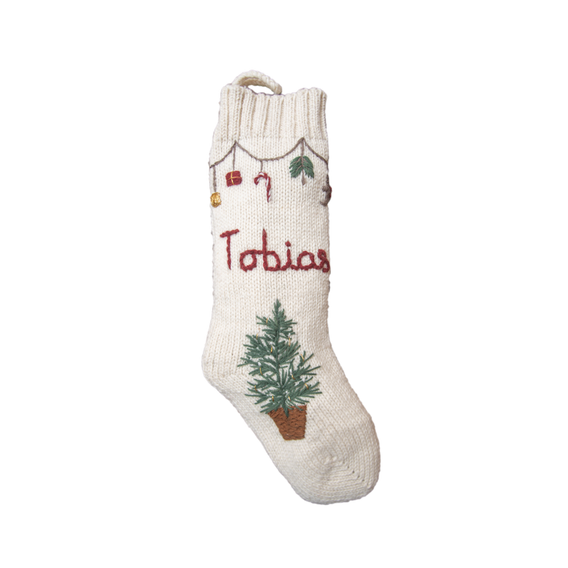 Personalized Garland Stocking in Cream White color with hand-embroidered Christmas tree, basket, and garland, featuring custom name embroidery for a traditional festive touch.