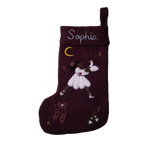 Personalized dark grape holiday stocking featuring embroidered Odette and custom name, hanging on a mantel. Showcases elegant design and festive charm.