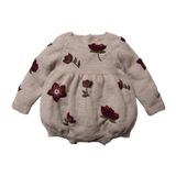 knitted and embroidered hellebores romper for babies