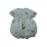 blue knitted and hand embroidered botanical romper