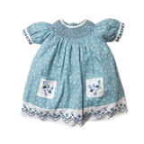 blue sewn dress for kids with handcrafted details