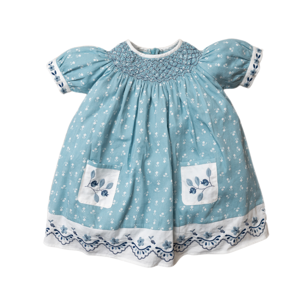 blue sewn dress for kids with handcrafted details