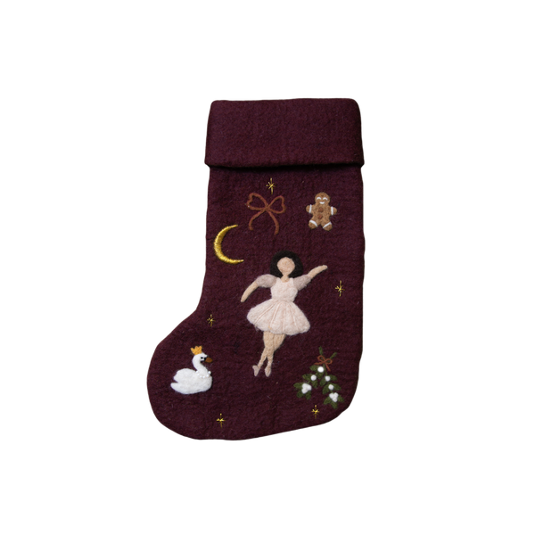 Fully handcrafted dark grape holiday stocking featuring an embroidered ballerina and enchanting holiday motifs, made from 100% wool.