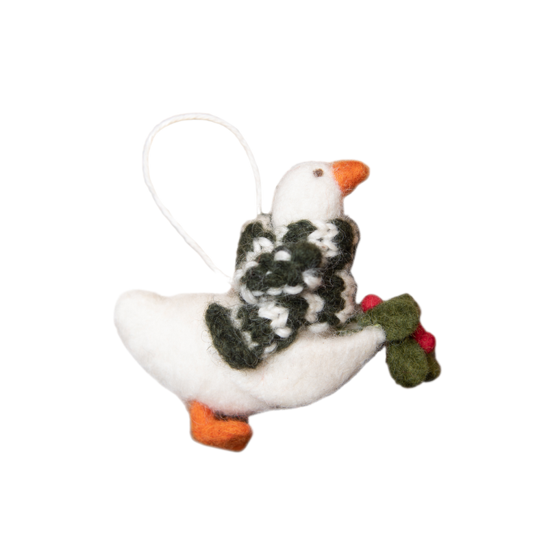 Felted goose ornament with a scarf, showcasing meticulous craftsmanship and intricate details. The whimsical design adds character and a cozy, handmade appeal to holiday decor.