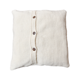 the backside of our knitted  and embroidered joy pillow cover