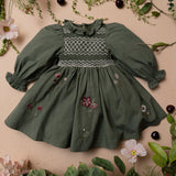 green dress for kids with smock details and flower embroidery
