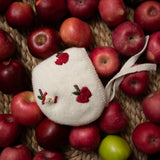 knitted and embroidered cream white apple bonnet for children