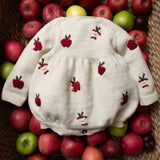 knitted and embroidered romper with apple embroideries