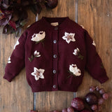 KNITTED AND EMBROIDERED HELLEBORES CARDIGAN FOR CHILDREN AND BABIES