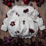 knitted and embroidered hellebores romper for babies