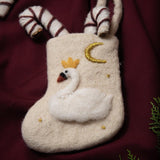 hand felted mini stocking for christmas with a swan on it