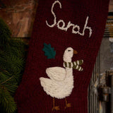 Close-up of hand-embroidered Christmas goose and custom name on Personalized Goose Stocking in Dark Grape color.