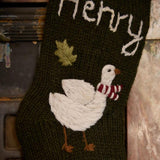 Close-up of hand-embroidered Christmas goose and custom name on Personalized Goose Stocking in Moss color.