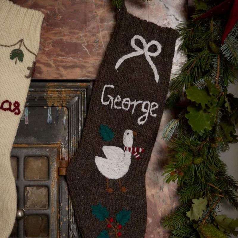 Close-up of hand-embroidery on Personalized Goose Stocking in Nutty Brown color, highlighting craftsmanship and custom name addition.