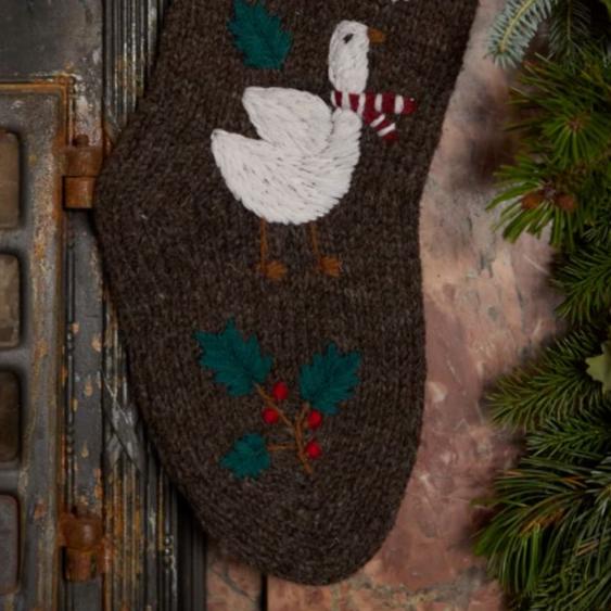 Close-up of hand-embroidered Christmas goose with scarf on Goose Stocking in Nutty Brown color.