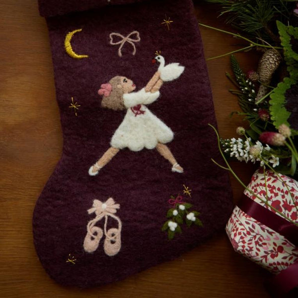 Dark grape holiday stocking with embroidered Odette and festive motifs displayed in a Christmas setting, adding elegance and charm to holiday decor.