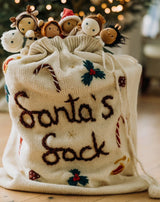 big white santa sack for christmas with embroidered details