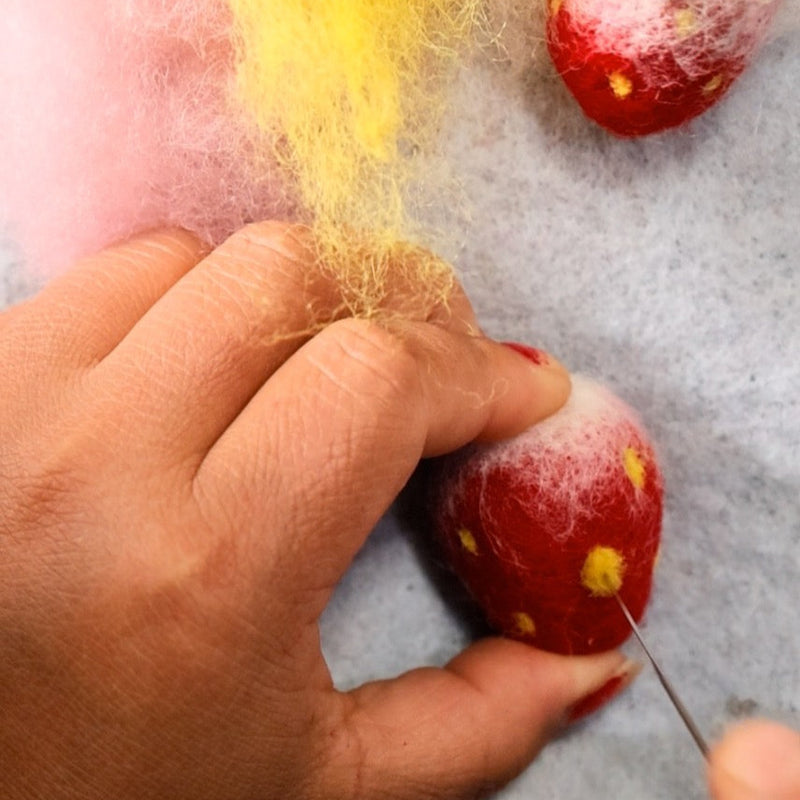 making of the strawberry ornament