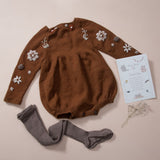 flay lay picture of baby leggings taupe along with flora romper caramel