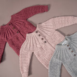 Flat lay picture of edith cardigan deep berry, dusty pink and light grey