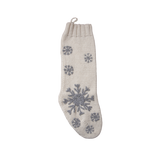 Hand-knitted Christmas stocking in Cream White color featuring a hand-embroidered snowflake and JOY pattern, designed to hold treasures from Santa.